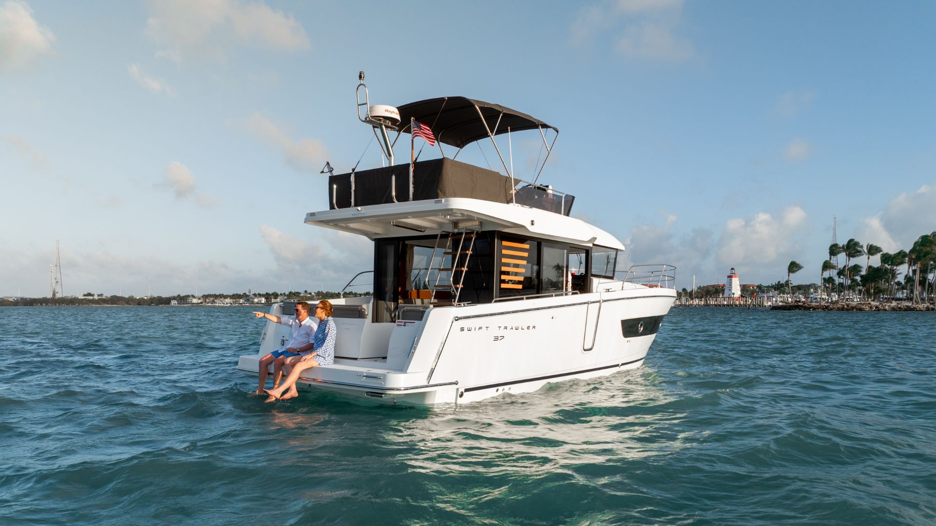 Beneteau Swift Trawler 37 Fly relaxing at water