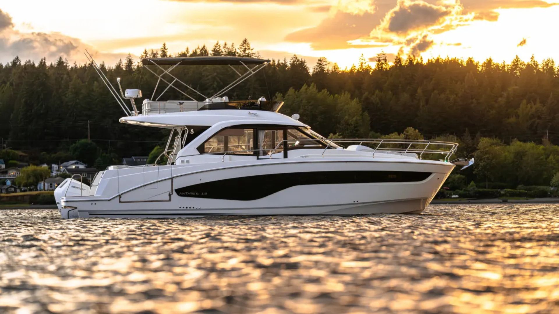 Beneteau Antares 12 Fly - on water at sunset