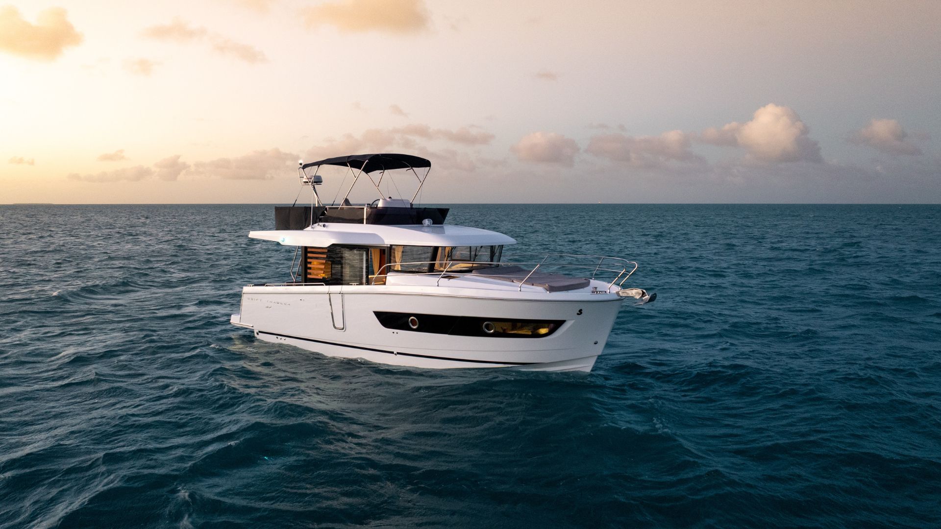 Beneteau Swift Trawler 37 Fly relaxing on water